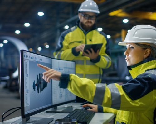 Inside,The,Heavy,Industry,,Factory,Female,Industrial,Engineer,Works,On